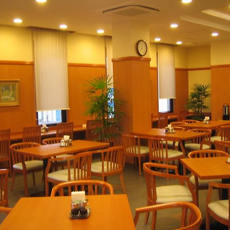 Hotel Route-Inn Kitakyushu-Wakamatsu Ekihigashi Buitenkant foto