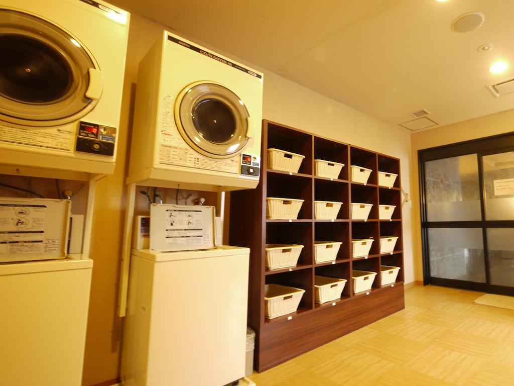 Hotel Route-Inn Kitakyushu-Wakamatsu Ekihigashi Buitenkant foto